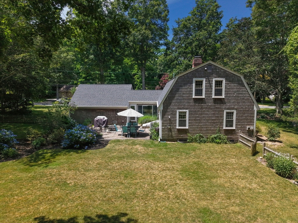 2 Jonathan Lane Sandwich, MA 02563 - Photo 29 of 38 a front view of a house with garden