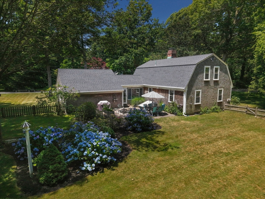 2 Jonathan Lane Sandwich, MA 02563 - Photo 30 of 38 a front view of a house with garden