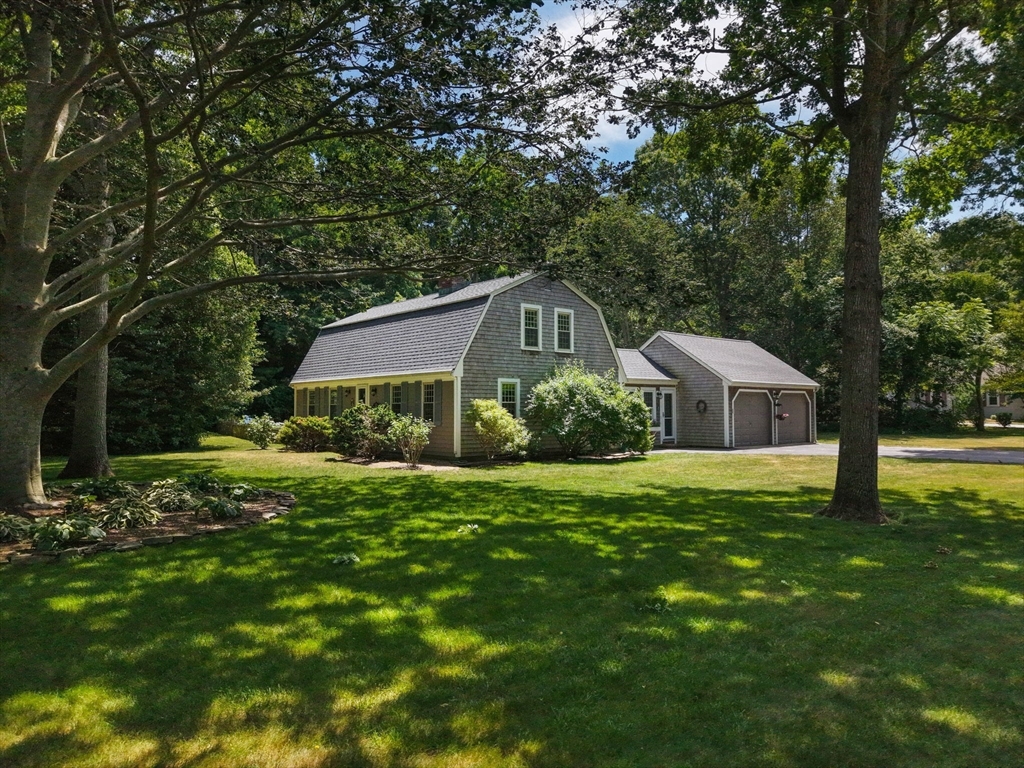 2 Jonathan Lane Sandwich, MA 02563 - Photo 37 of 38 a front view of a house with yard and green space