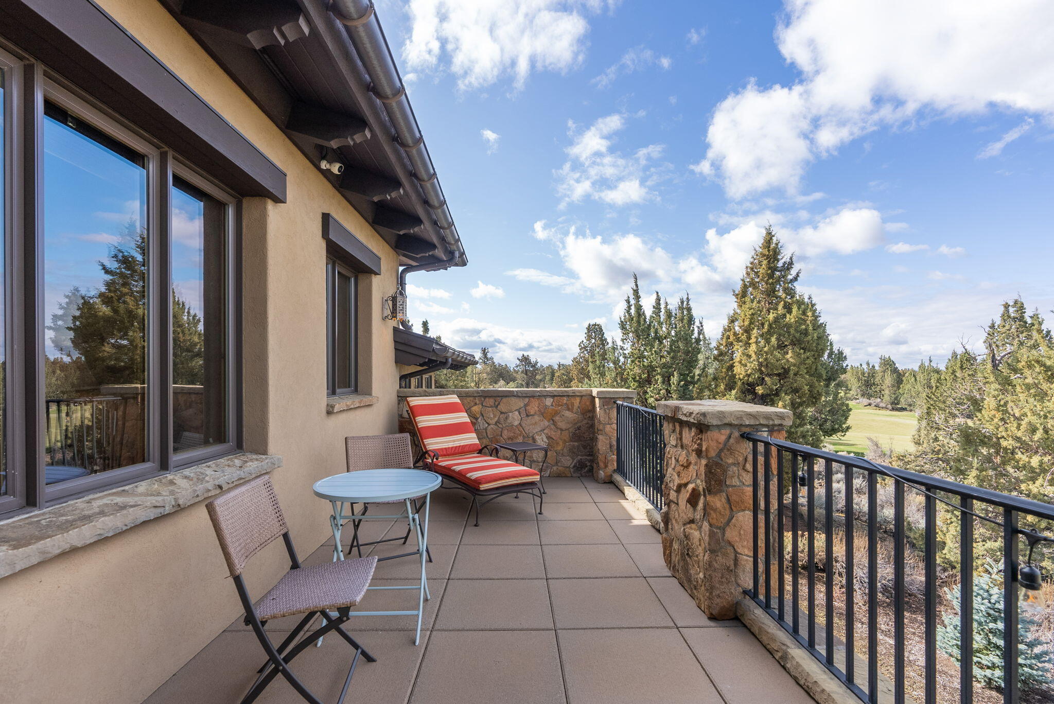 22887 Ghost Tree Lane Bend, OR 97701 - Photo 54 of 97 Primary bedroom's private balcony to enjoy the expansive Cascade Mountian Views and Fazio fairway.