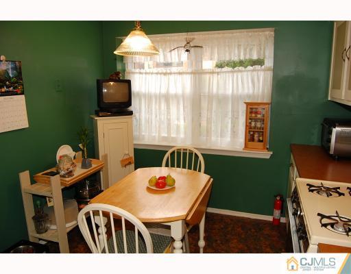 1919 Raspberry Court Edison, NJ 08817 - Photo 4 of 9 a dining room with furniture and window