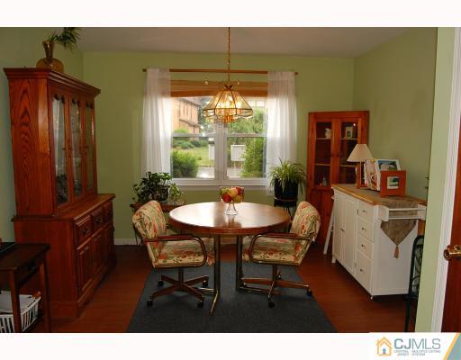 1919 Raspberry Court Edison, NJ 08817 - Photo 5 of 9 a view of a livingroom with furniture and window