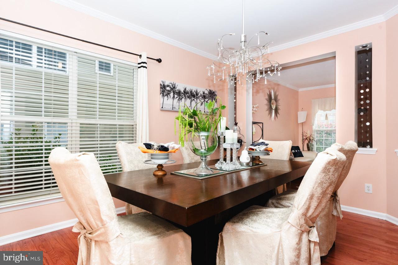 18278 Maple Spring Court Leesburg, VA 20176 - Photo 8 of 35 Elegant dining space with warm hues.