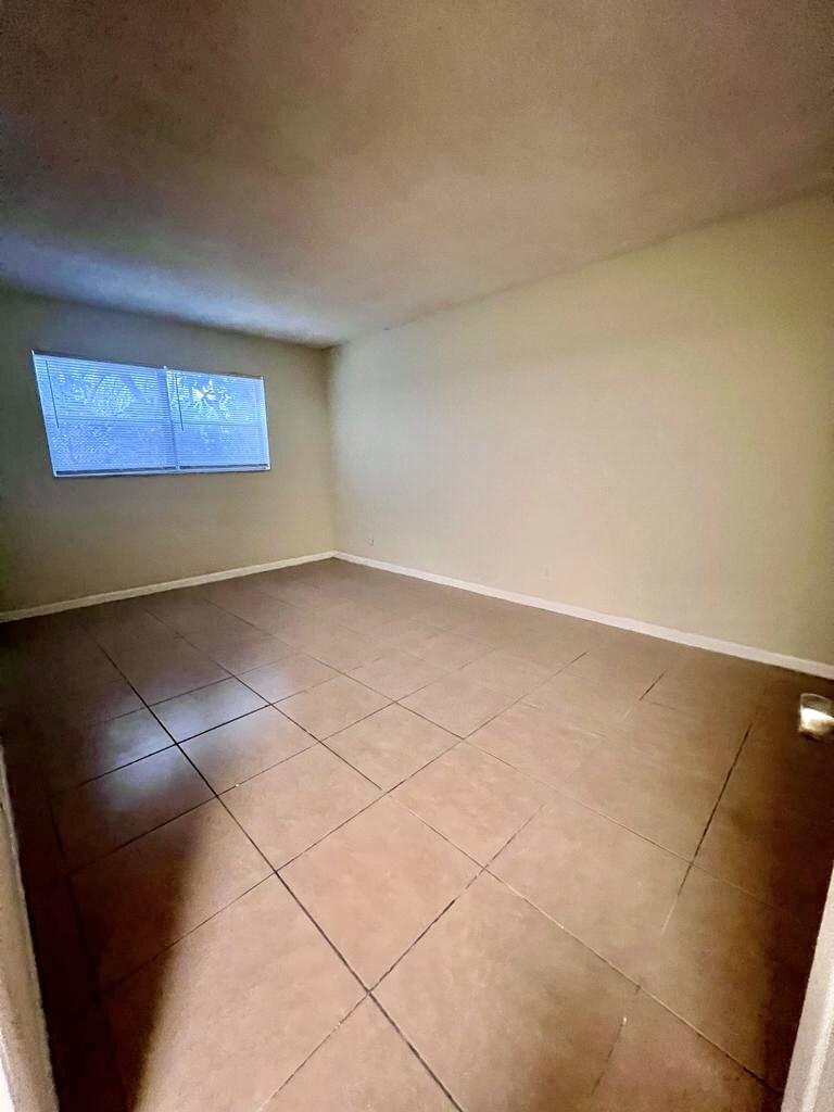 645 Southwest 20th Court, Unit 20 Delray Beach, FL 33445 - Photo 15 of 18 a view of an empty room