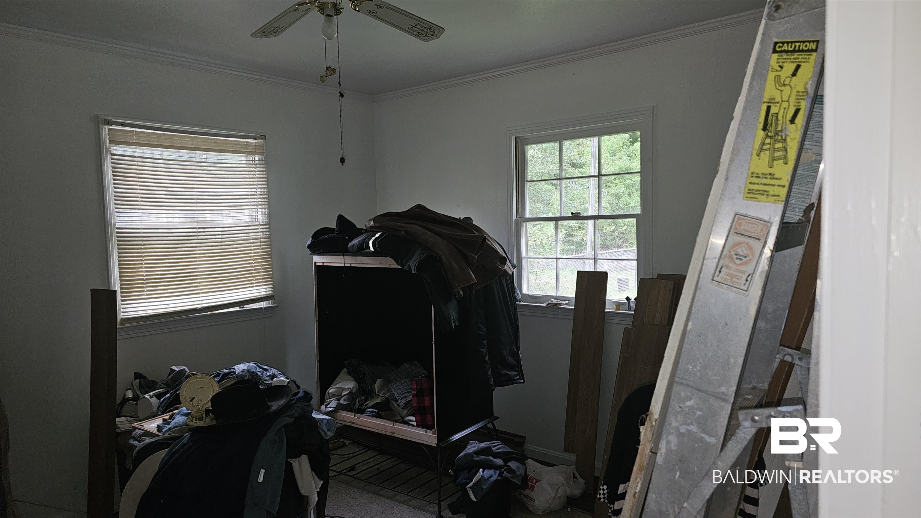 216 6th Avenue Atmore, AL 36502 - Photo 13 of 34 Interior space with ceiling fan and ornamental molding
