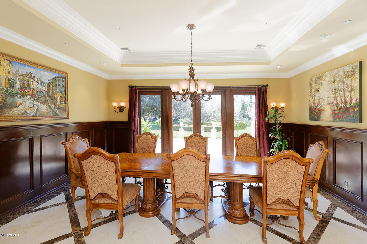 110 West Potrero Road Thousand Oaks, CA 91361 - Photo 11 of 33 a view of a dining room with furniture a chandelier and large windows