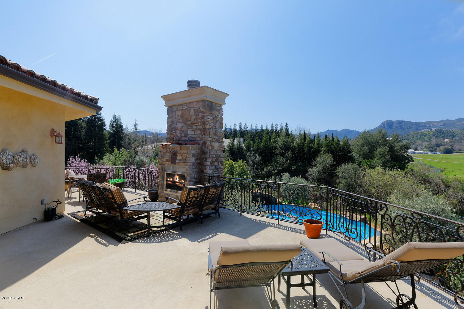 110 West Potrero Road Thousand Oaks, CA 91361 - Photo 20 of 33 a terrace with outdoor seating and trees