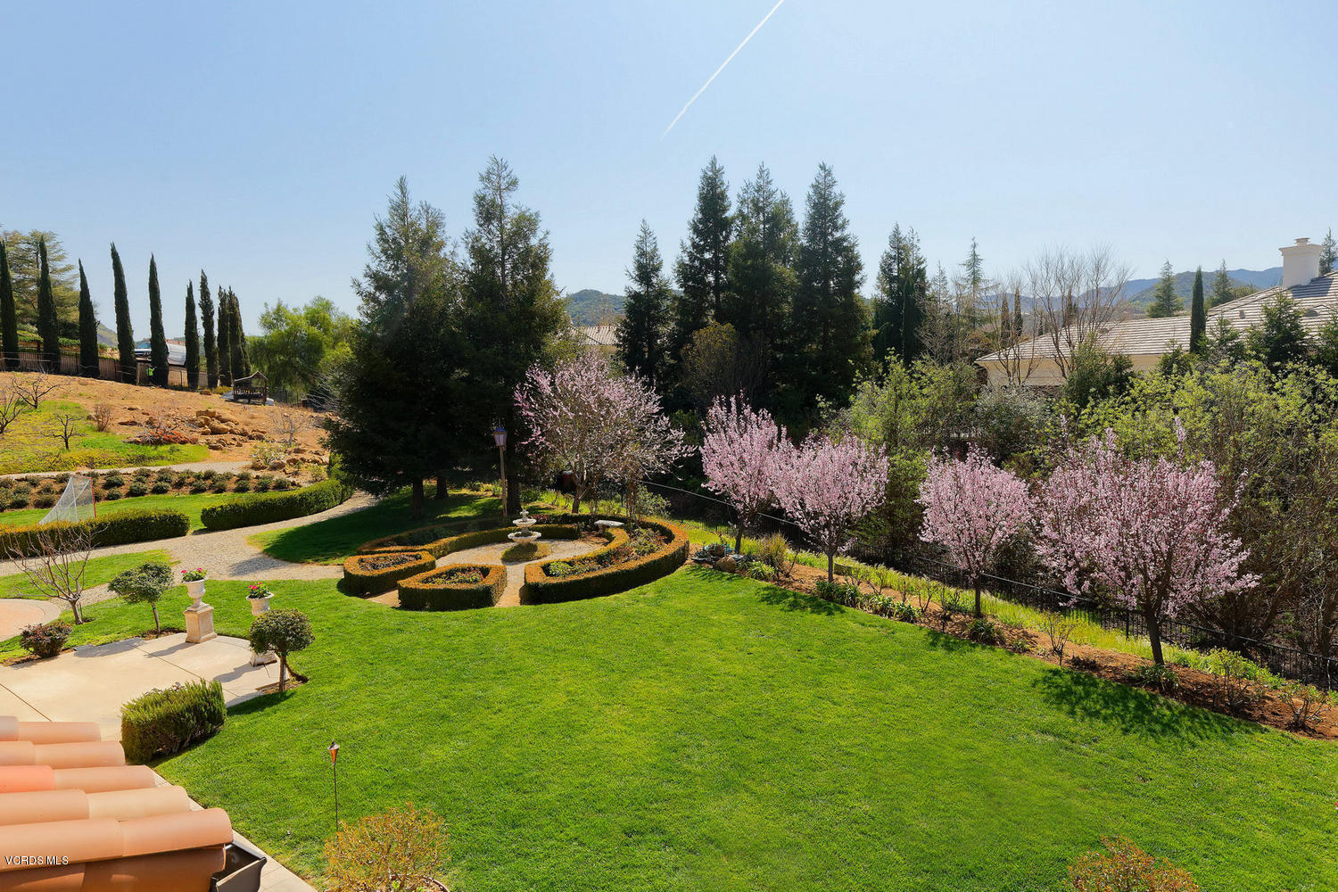 110 West Potrero Road Thousand Oaks, CA 91361 - Photo 22 of 33 a view of an house with backyard space and garden
