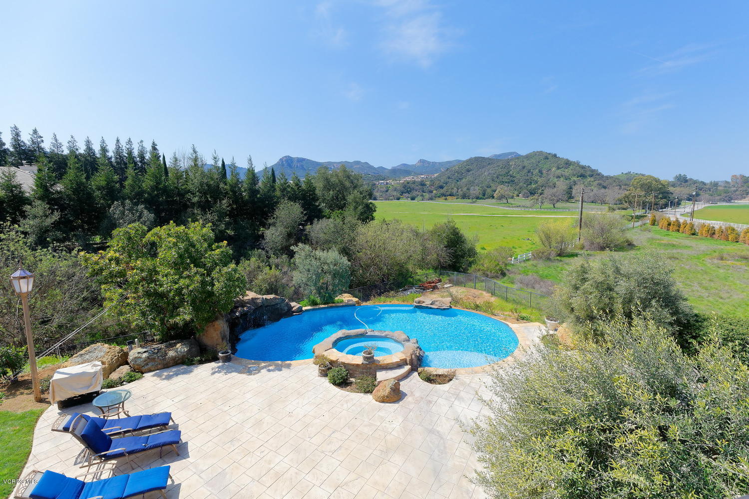110 West Potrero Road Thousand Oaks, CA 91361 - Photo 23 of 33 a view of a lake from a swimming pool