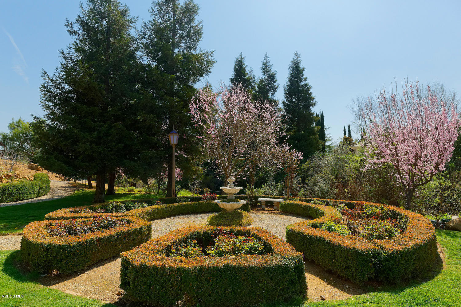 110 West Potrero Road Thousand Oaks, CA 91361 - Photo 26 of 33 a view of a garden with lawn chairs