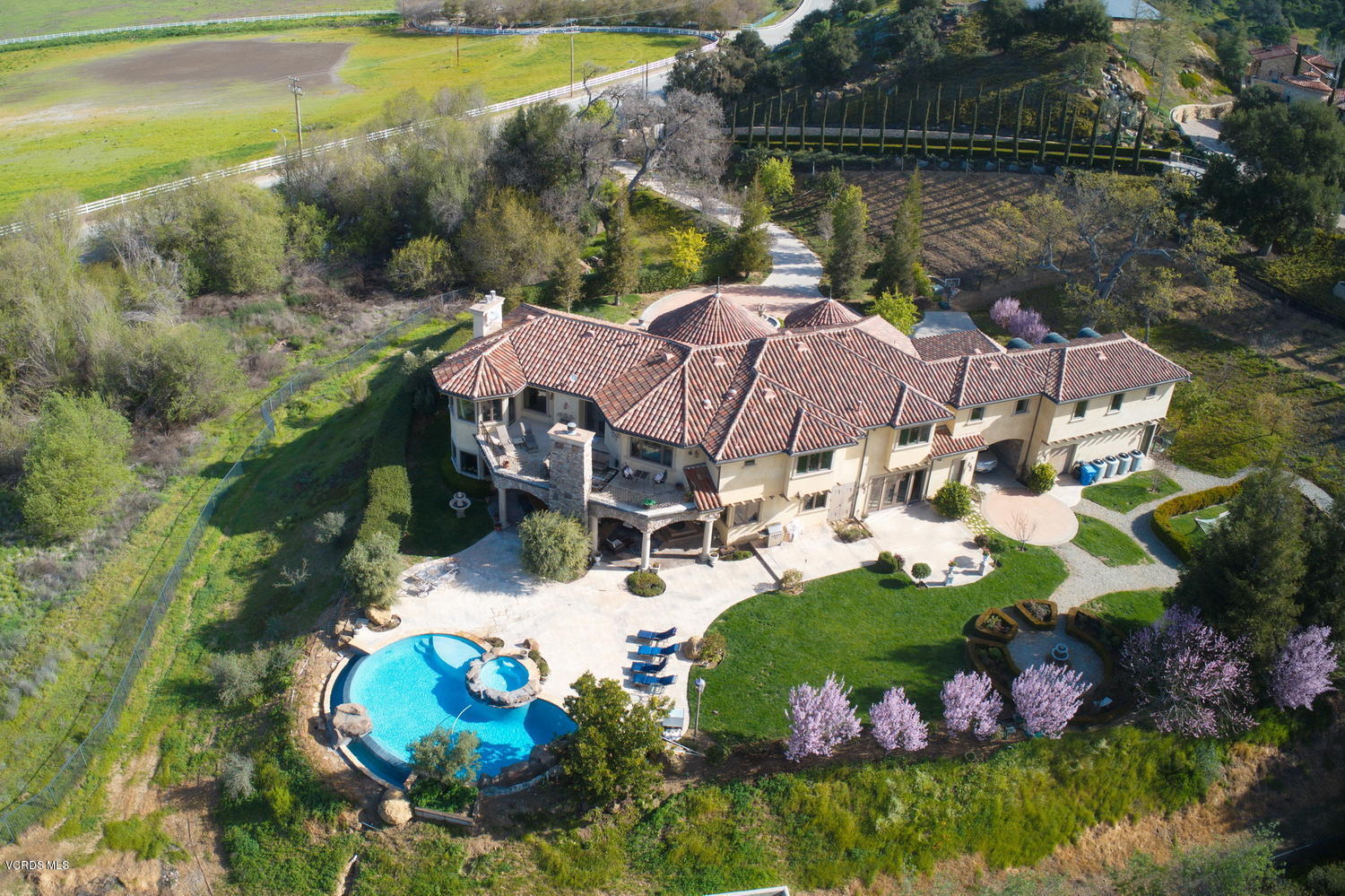 110 West Potrero Road Thousand Oaks, CA 91361 - Photo 32 of 33 a aerial view of a house with a garden and lake view