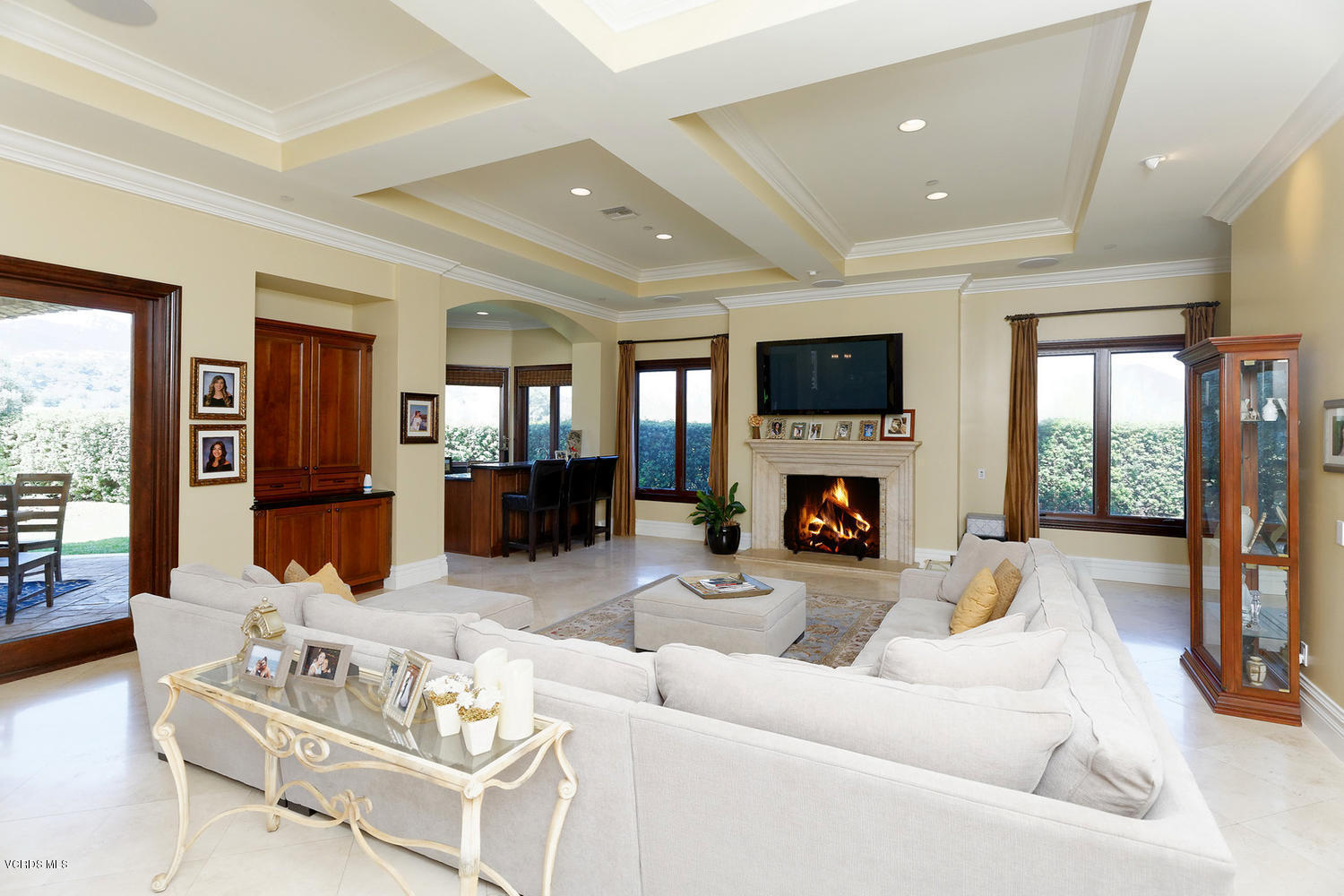 110 West Potrero Road Thousand Oaks, CA 91361 - Photo 9 of 33 a living room with furniture a fireplace and a flat screen tv