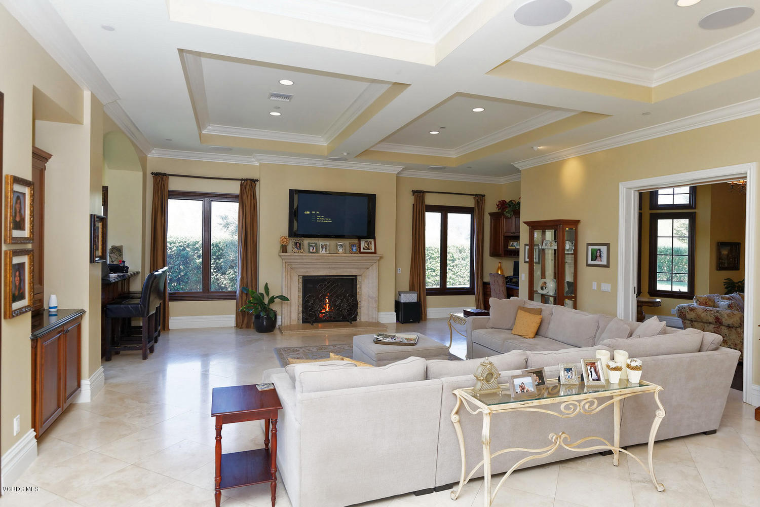 110 West Potrero Road Thousand Oaks, CA 91361 - Photo 10 of 33 a living room with furniture a fireplace and a flat screen tv