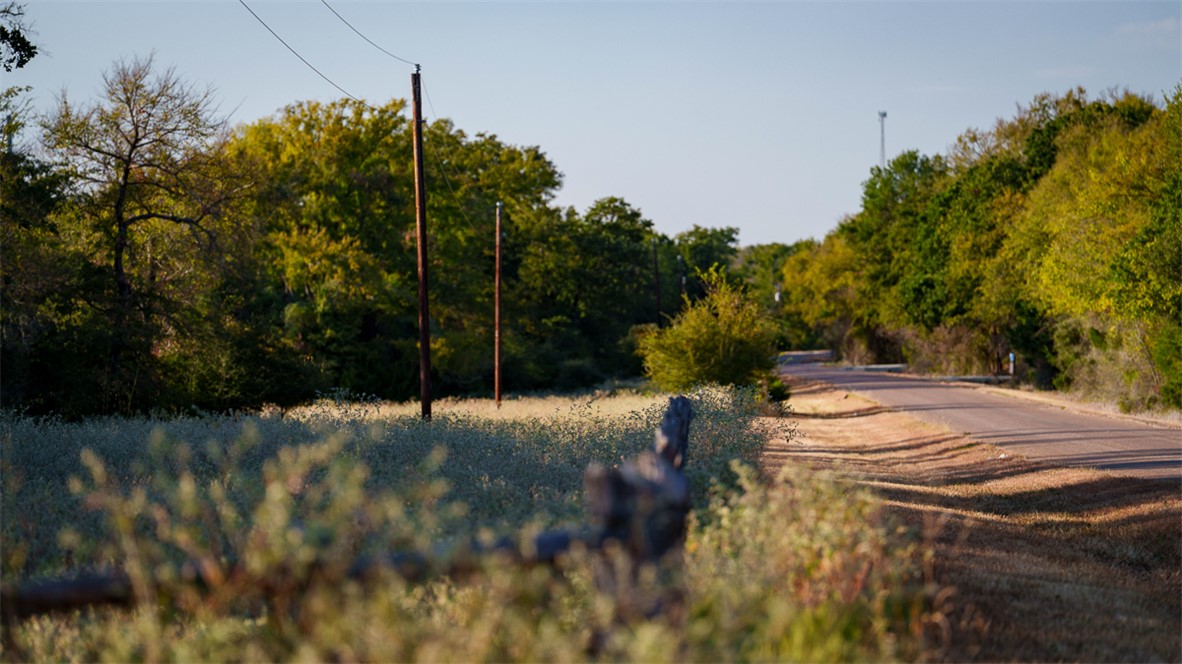 11258 Providence Road Hearne, TX 77859 - Photo 30 of 39 a view of a street with a yard