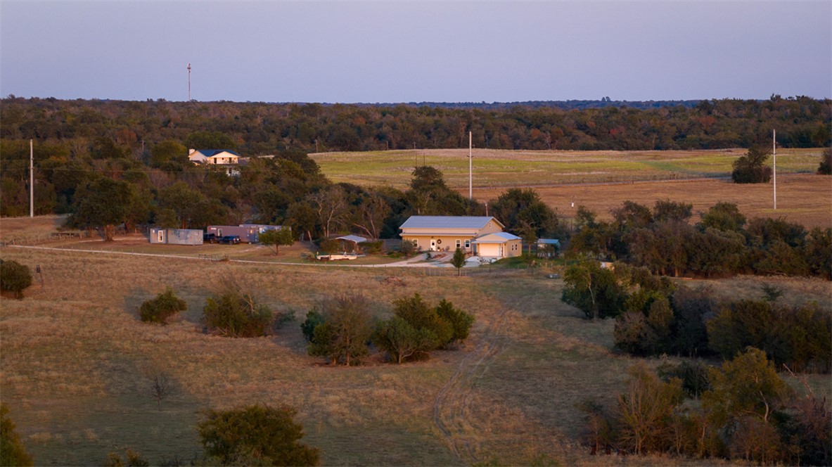 11258 Providence Road Hearne, TX 77859 - Photo 38 of 39 a view of a lake with a mountain in the background