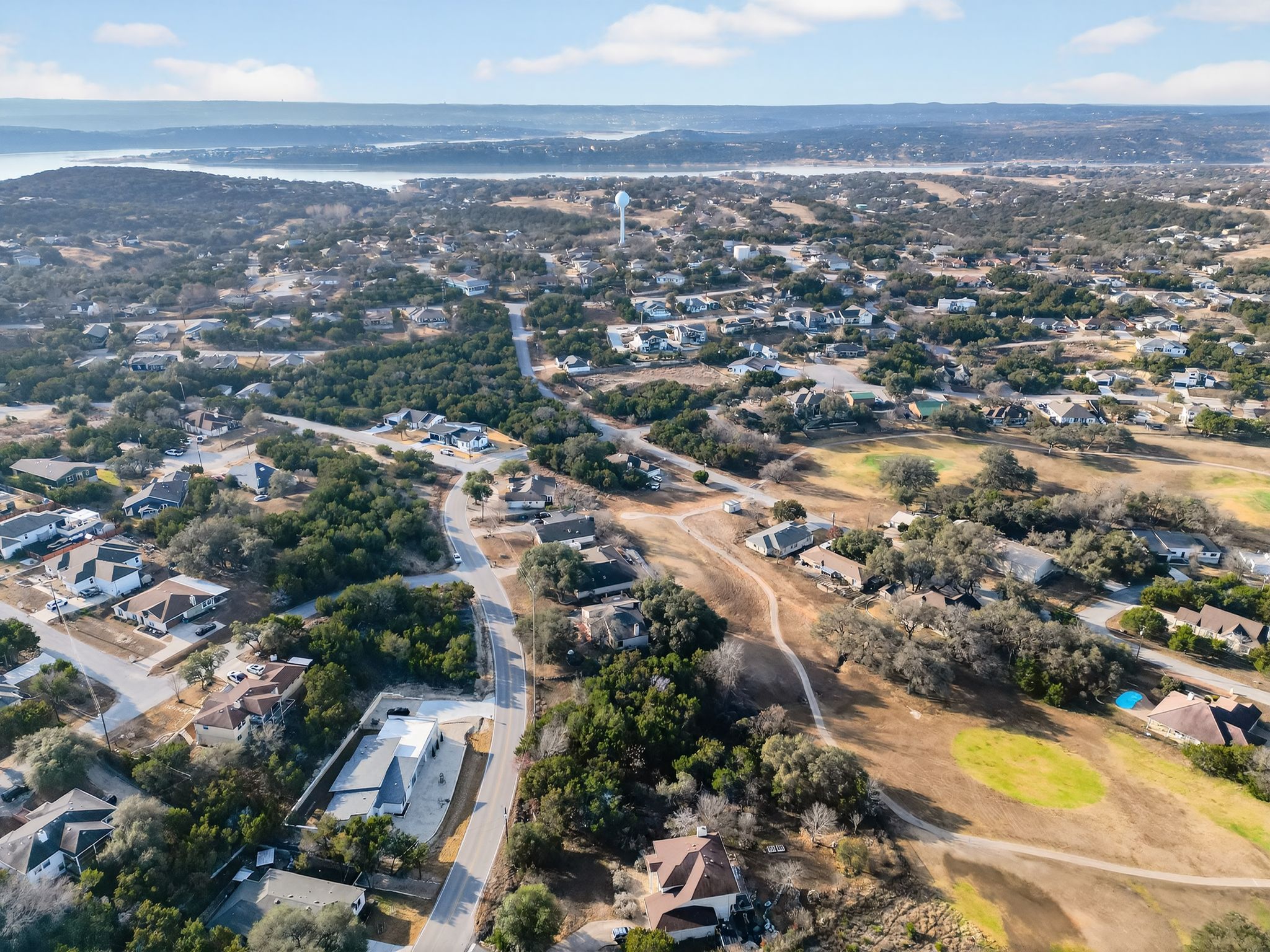4106 Outpost Trace Lago Vista, TX 78645 - Photo 32 of 40 an aerial view of residential houses with outdoor space