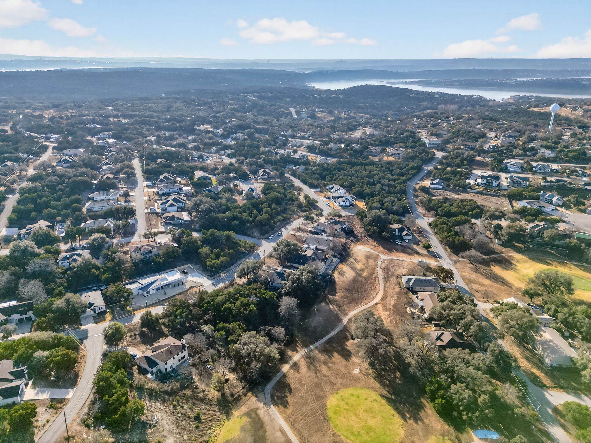 4106 Outpost Trace Lago Vista, TX 78645 - Photo 34 of 40 an aerial view of residential houses with outdoor space