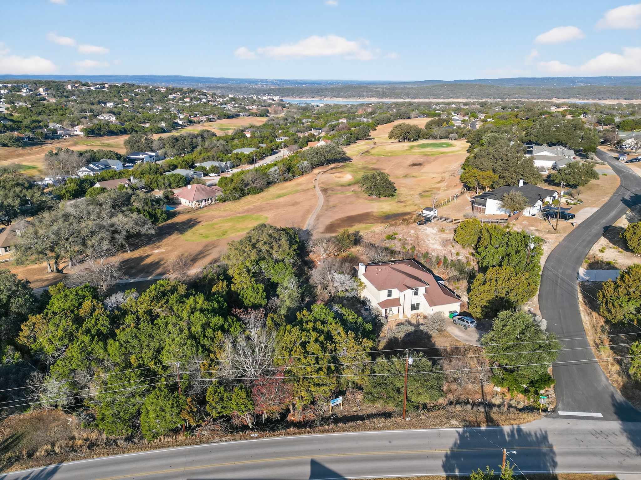 4106 Outpost Trace Lago Vista, TX 78645 - Photo 35 of 40 an aerial view of residential building and lake