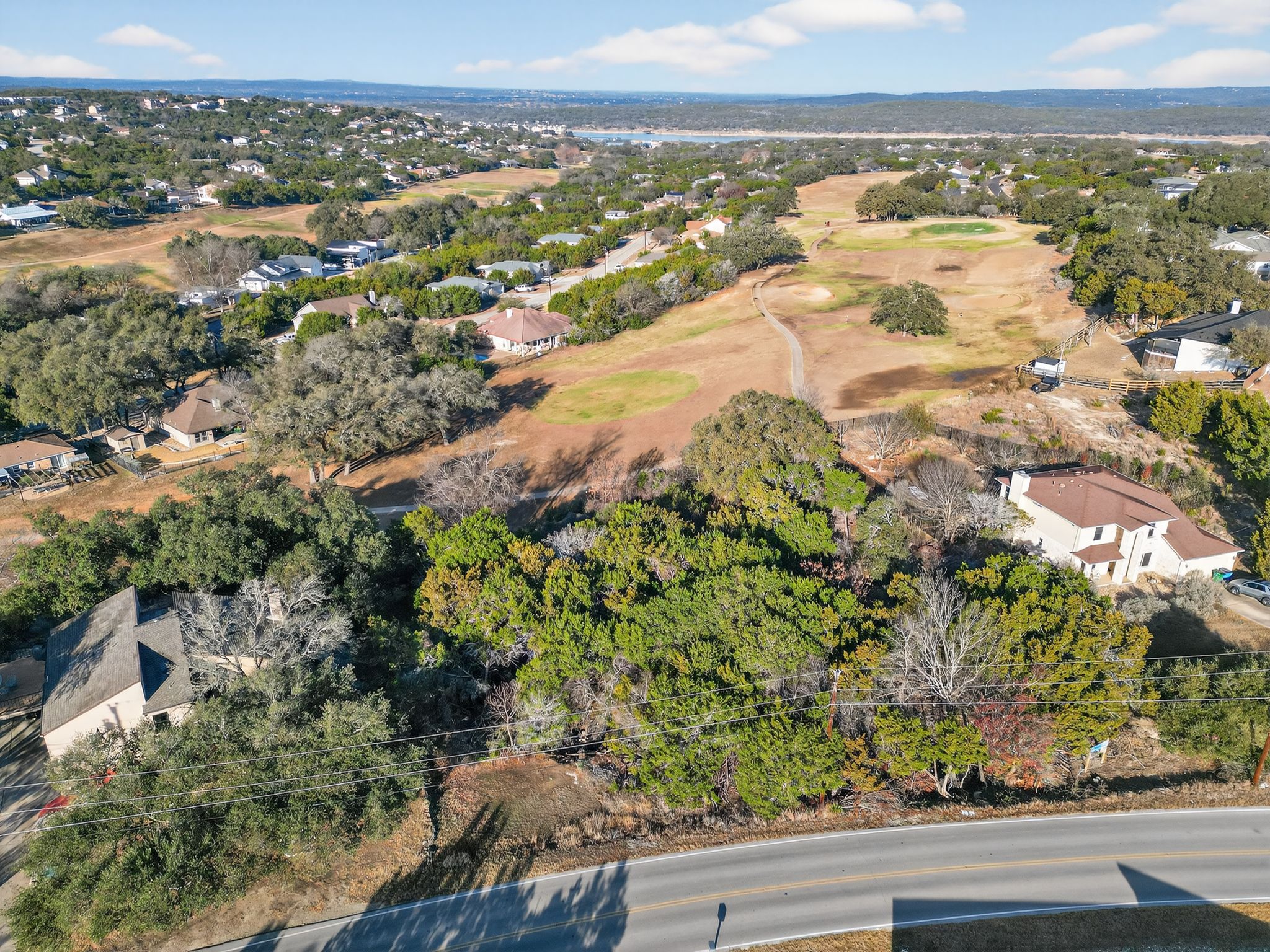 4106 Outpost Trace Lago Vista, TX 78645 - Photo 39 of 40 an aerial view of residential building and lake