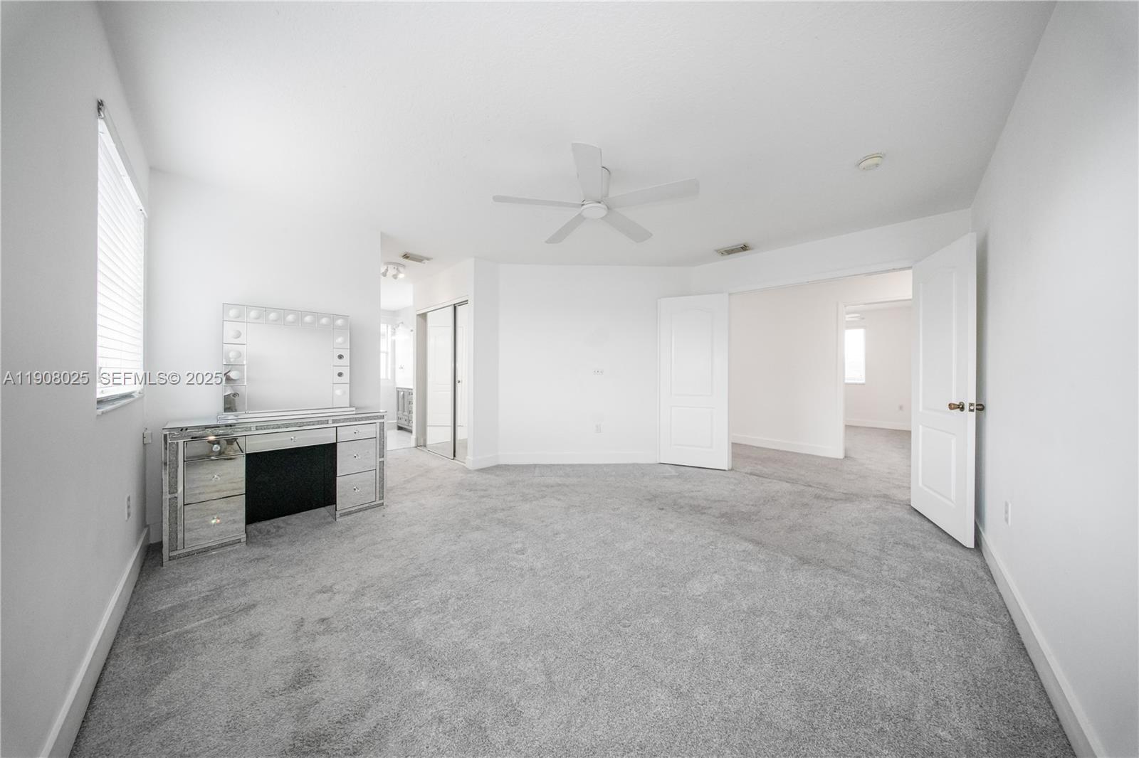 13868 Southwest 38th Terrace Miami, FL 33175 - Photo 15 of 30 a view of an empty room with a fireplace and a window