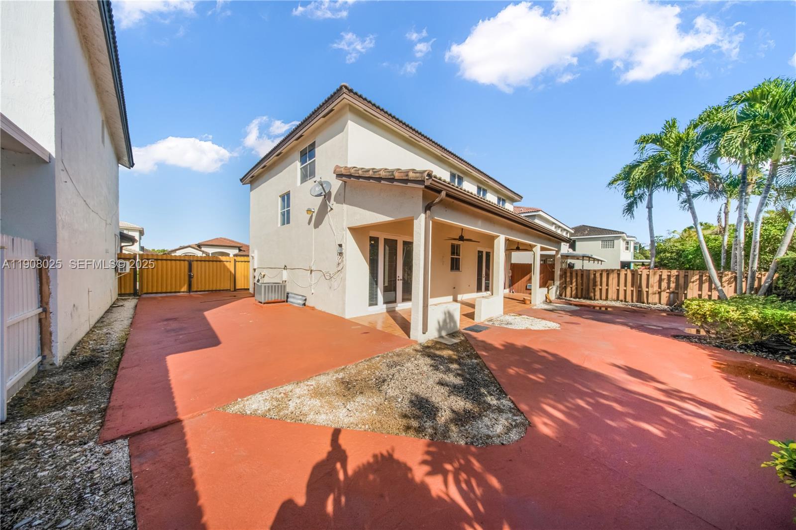 13868 Southwest 38th Terrace Miami, FL 33175 - Photo 26 of 30 a front view of a house with a yard