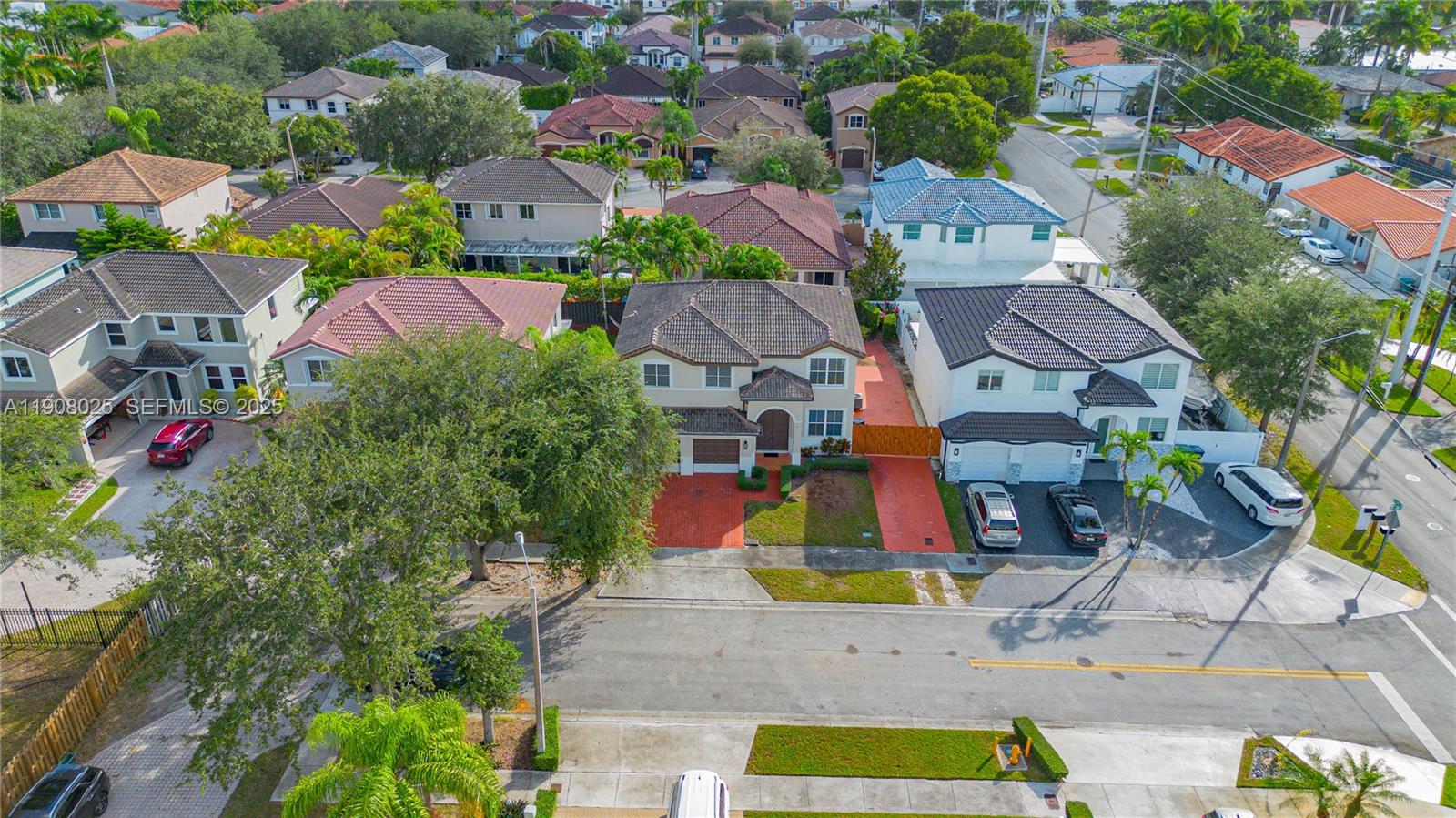 13868 Southwest 38th Terrace Miami, FL 33175 - Photo 28 of 30 an aerial view of residential houses with outdoor space and parking