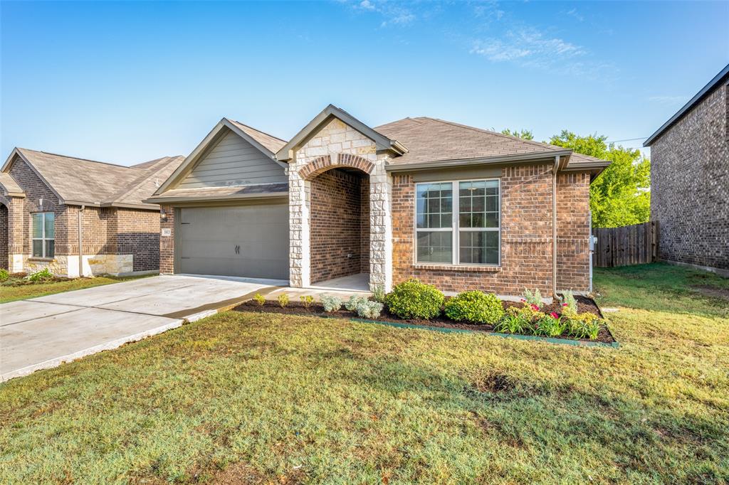 1013 Keystone Court Denton, TX 76207 - Photo 1 of 1 Single story home featuring a front lawn and a garage