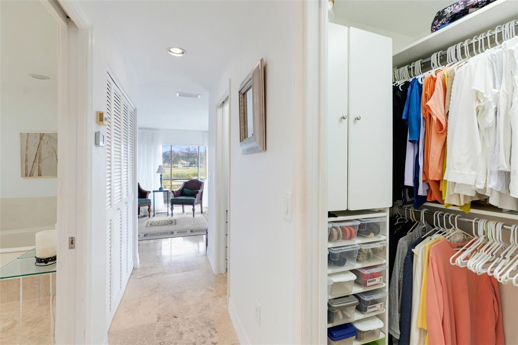 402 Devonshire Lane Venice, FL 34293 - Photo 25 of 52 a view of walk in closet with clothes and shoes