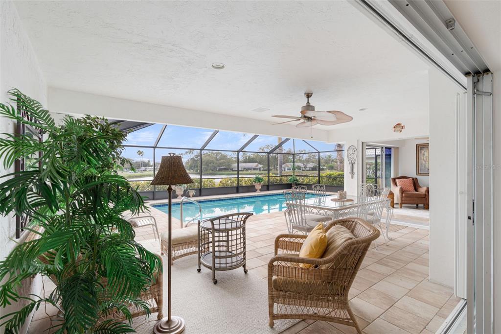 402 Devonshire Lane Venice, FL 34293 - Photo 26 of 52 an outdoor living and dining room view