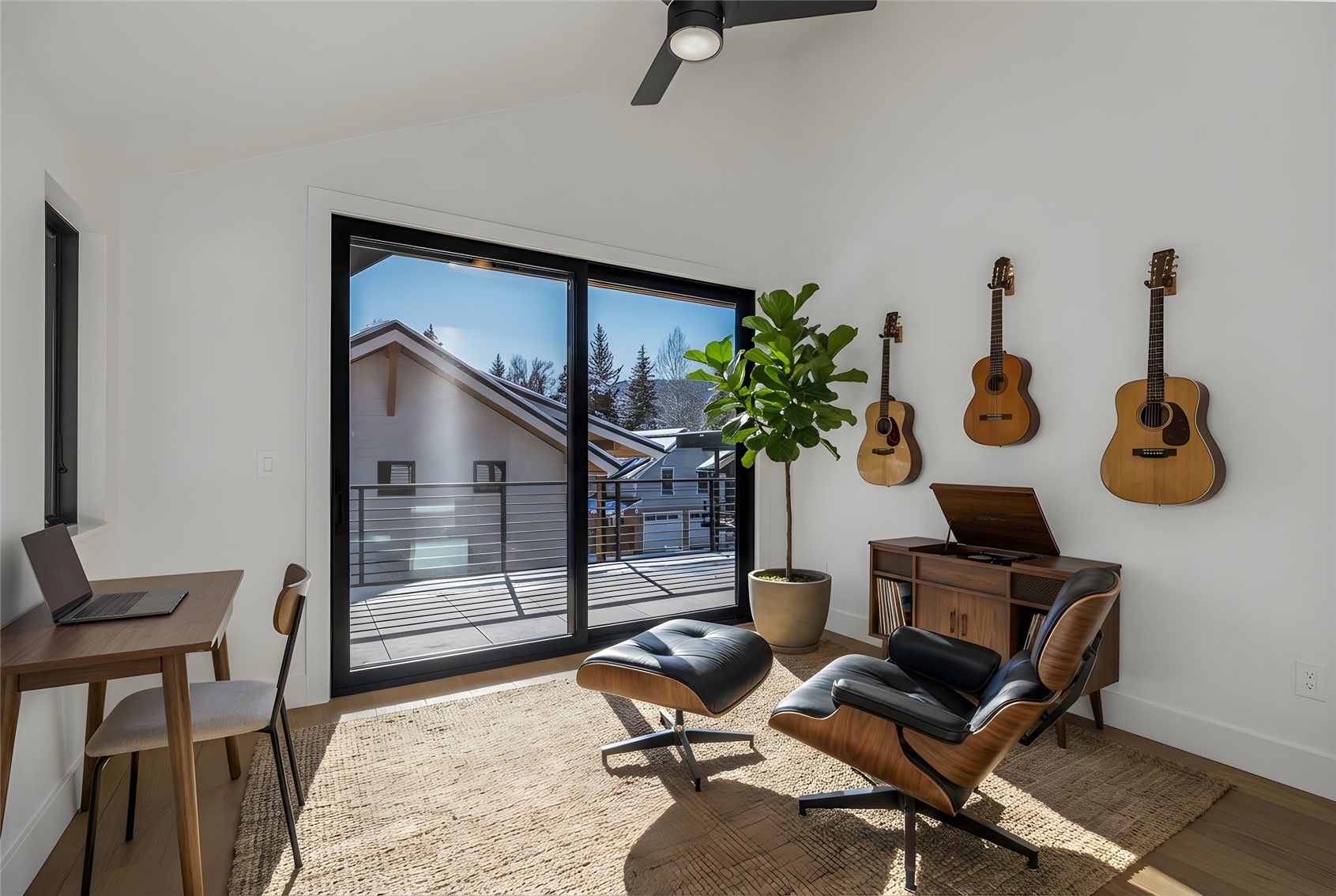 119 Spruce Street Steamboat Springs, CO 80487 - Photo 15 of 38 2nd floor flex Bedroom featuring doors to balcony and mountain views.