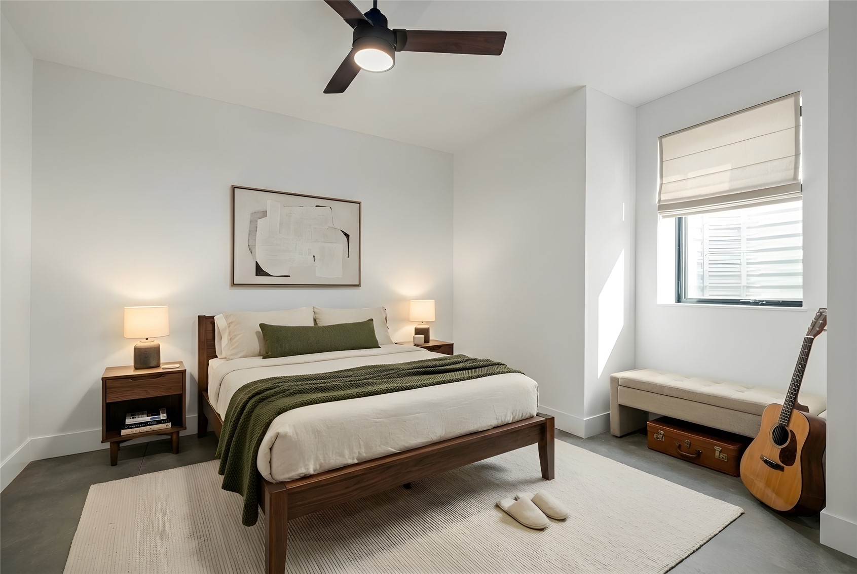119 Spruce Street Steamboat Springs, CO 80487 - Photo 18 of 38 Lower level Bedroom with finished concrete floors and a ceiling fan