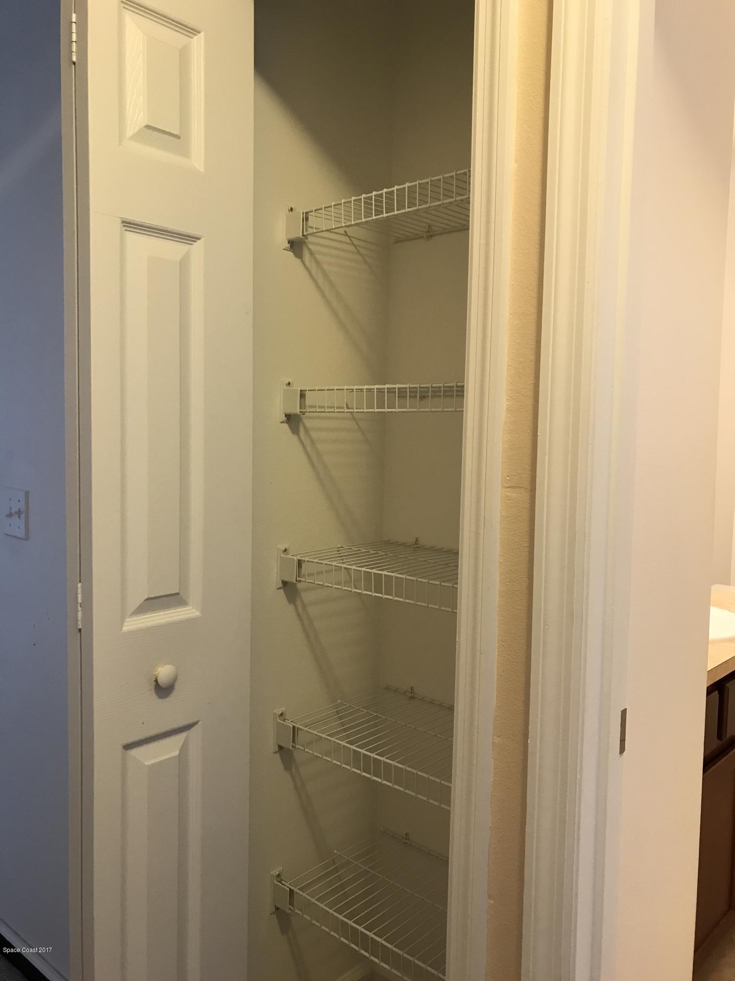 4026 Meander Place, Unit 208 Rockledge, FL 32955 - Photo 17 of 26 Hall Linen Closet