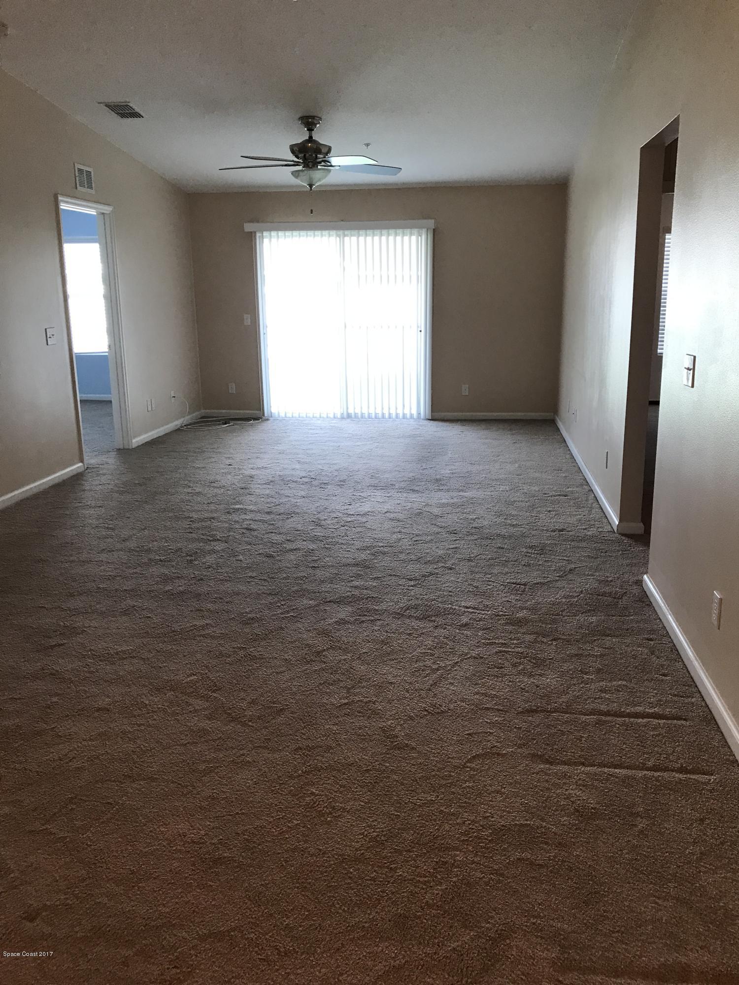 4026 Meander Place, Unit 208 Rockledge, FL 32955 - Photo 7 of 26 Living Room