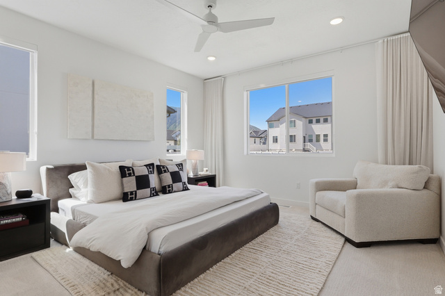3364 Mapleton Hts Drive, Unit 101 Mapleton, UT 84664 - Photo 13 of 37 Bright interior space featuring a ceiling fan with integrated lighting, recessed lighting, and multiple windows providing natural light