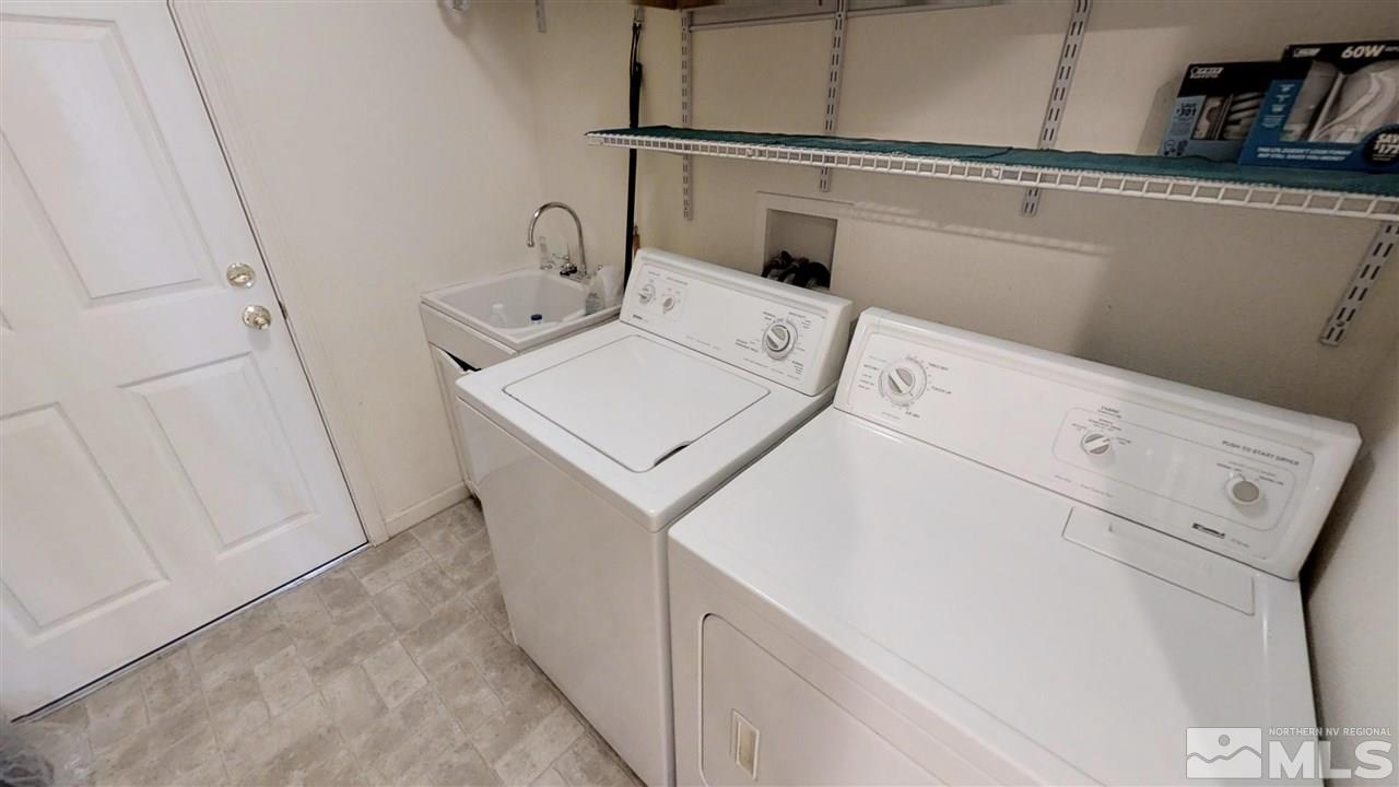 6080 Range Reno, NV 89510 - Photo 19 of 33 a utility room with dryer and washer