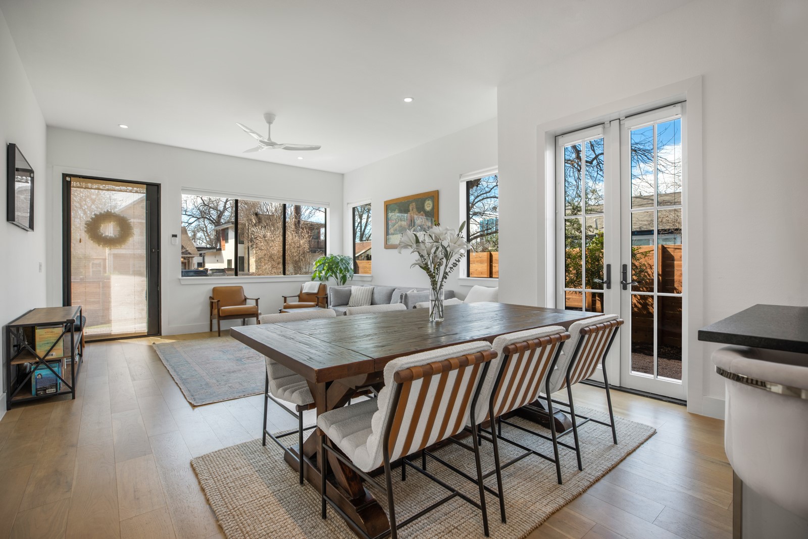1410 East 3rd Street, Unit A Austin, TX 78702 - Photo 5 of 40 a view of a dining room with furniture and wooden floor