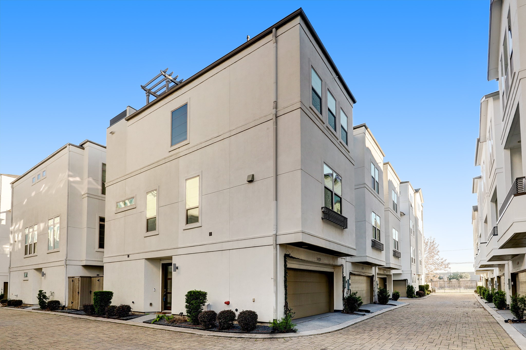 a view of a street with buildings