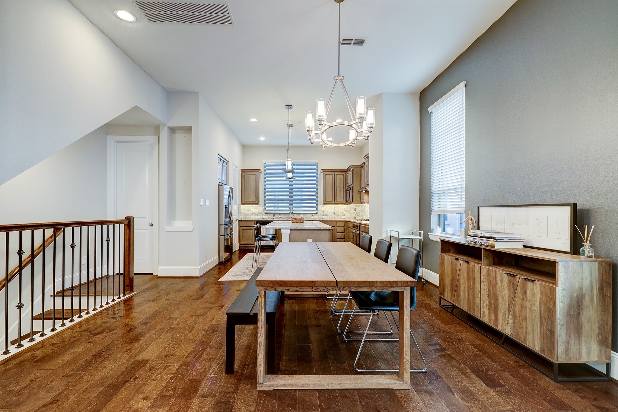 5453 Larkin Street Houston, TX 77007 - Photo 11 of 38 a view of a dining room with furniture window and wooden floor
