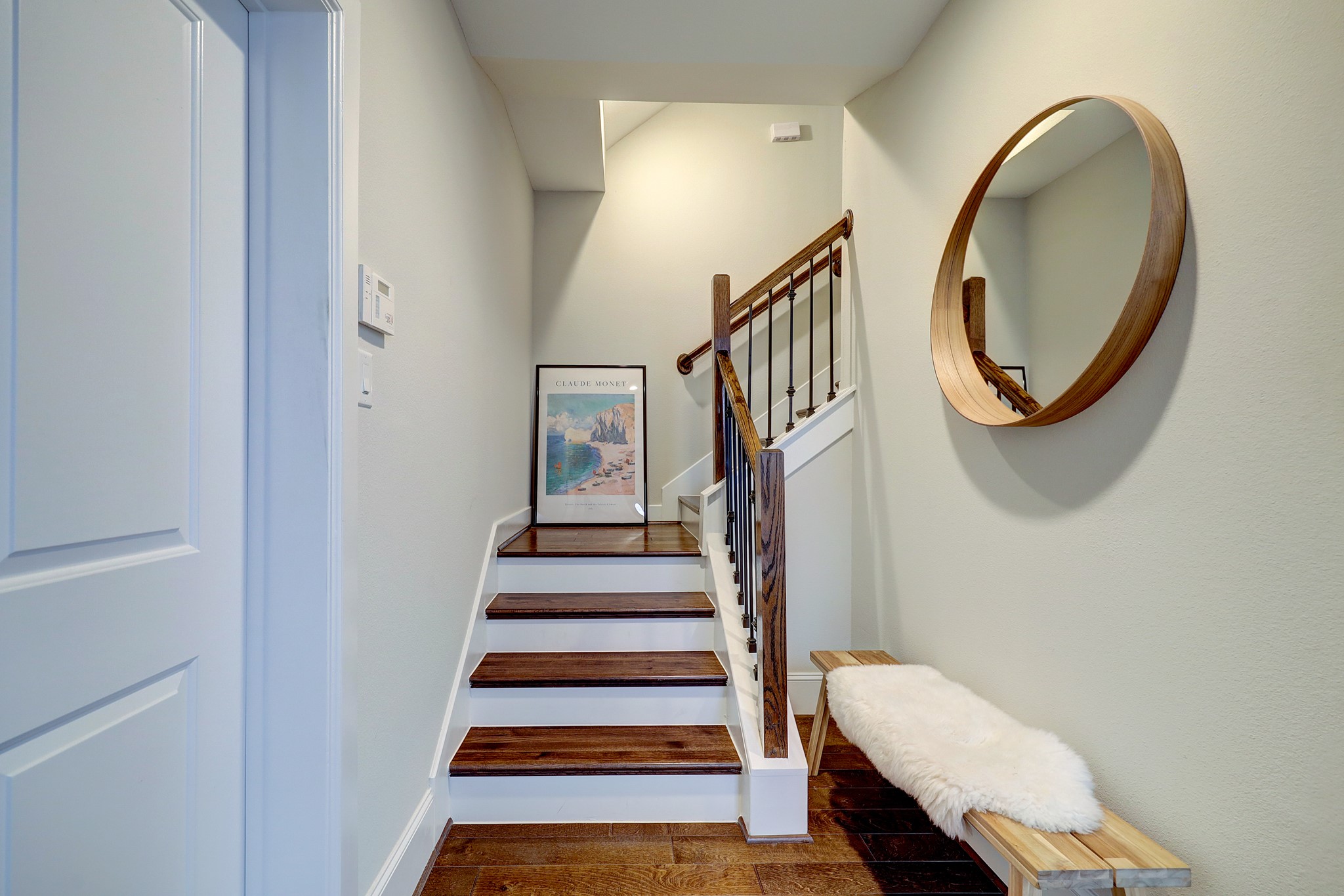 5453 Larkin Street Houston, TX 77007 - Photo 7 of 38 a view of entryway and hall with wooden floor
