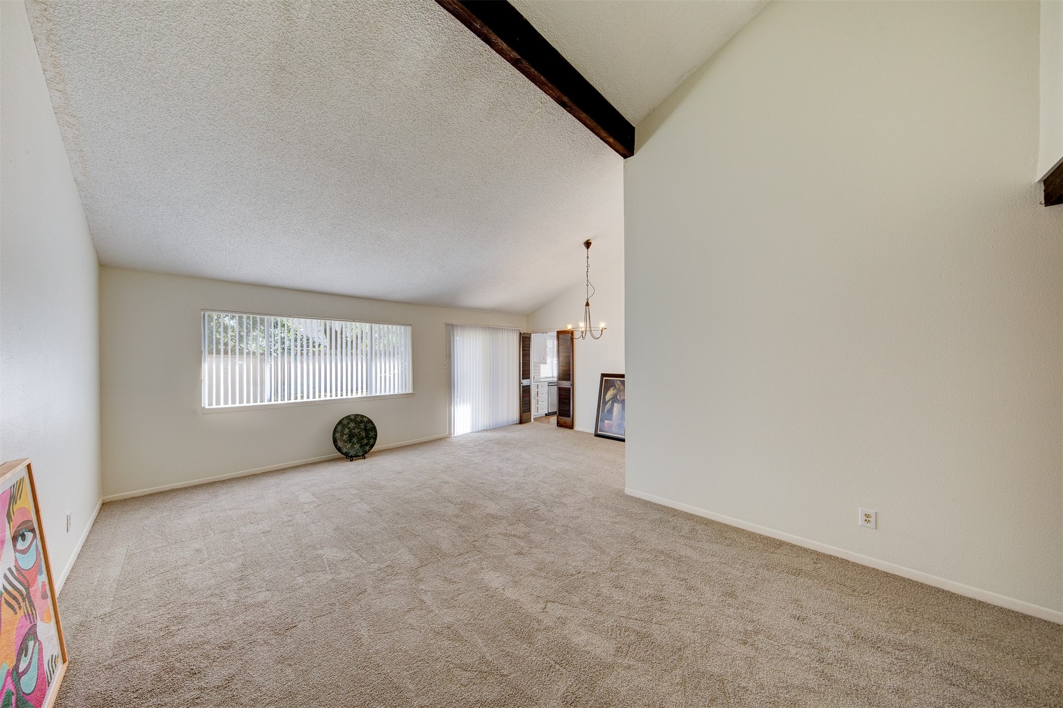 15802 Mill Point Drive Houston, TX 77059 - Photo 11 of 23 a view of a livingroom with an empty space and a window