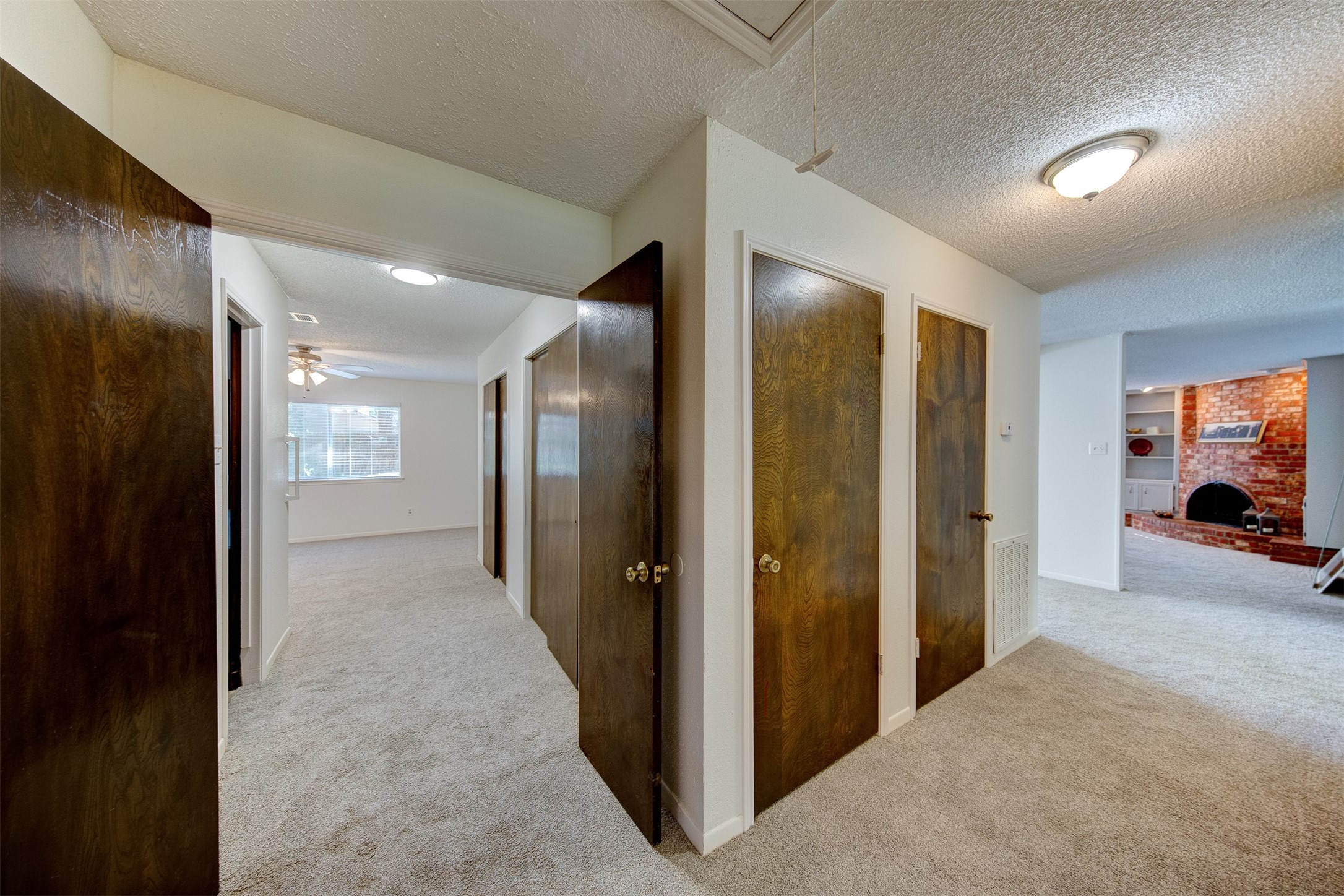 15802 Mill Point Drive Houston, TX 77059 - Photo 13 of 23 a view of a hallway with some rooms