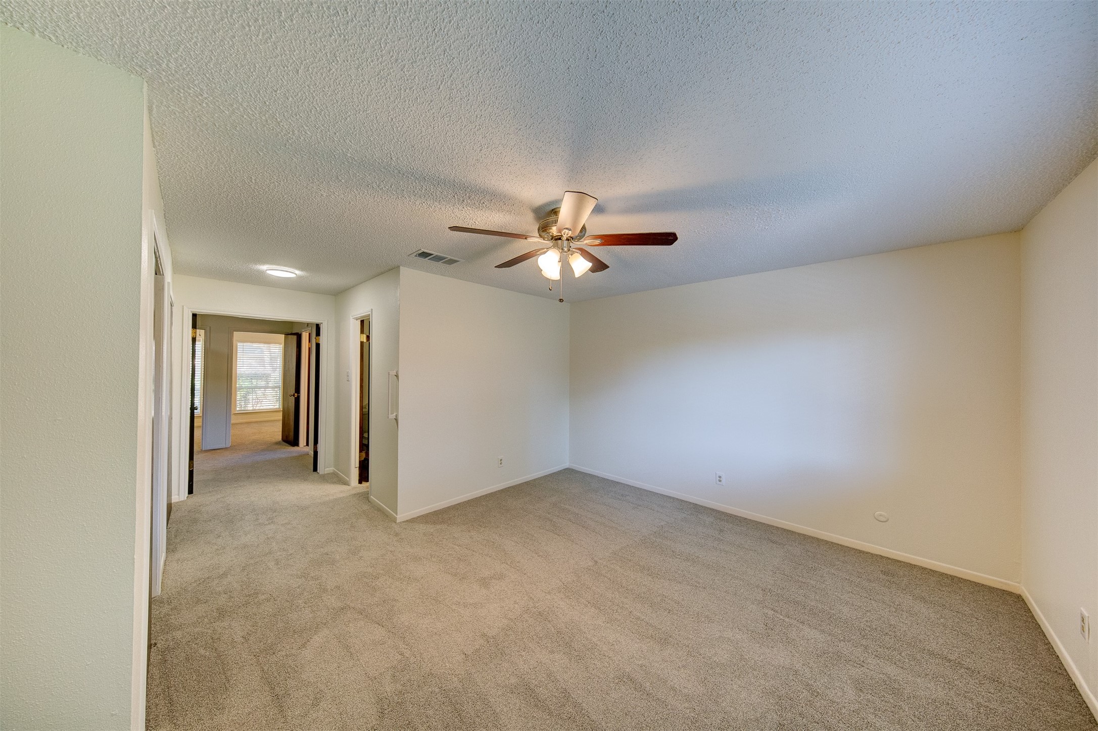 15802 Mill Point Drive Houston, TX 77059 - Photo 15 of 23 a view of a livingroom with a ceiling fan and window