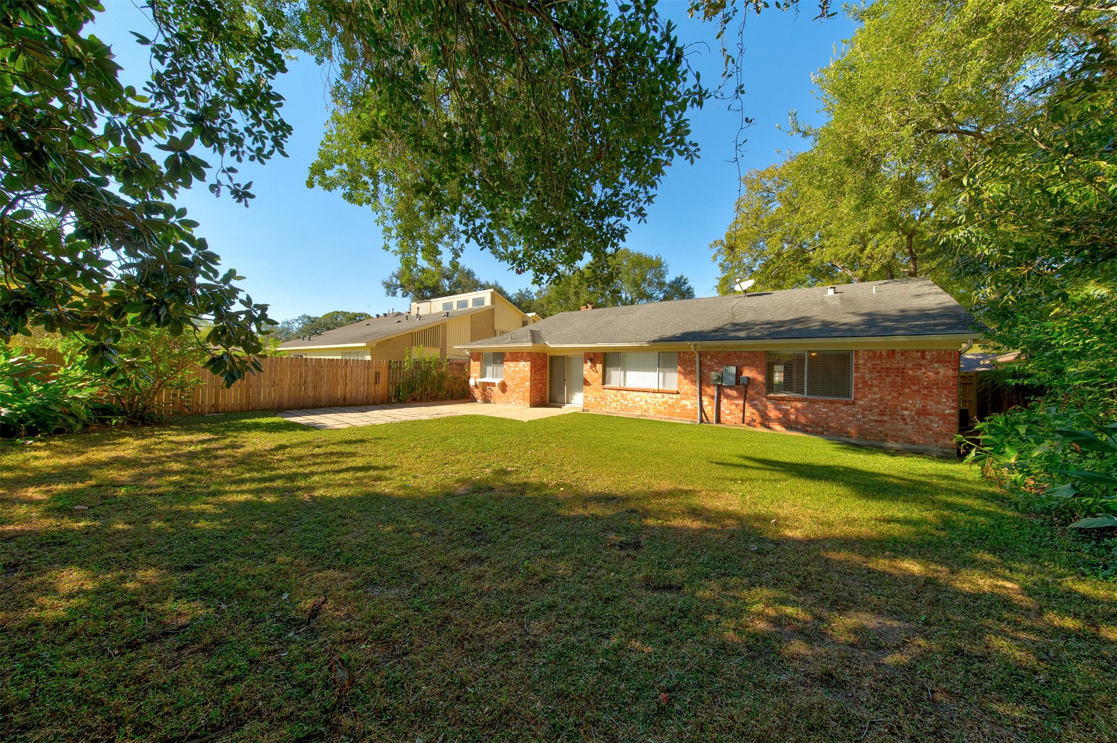 15802 Mill Point Drive Houston, TX 77059 - Photo 22 of 23 a front view of a house with a yard