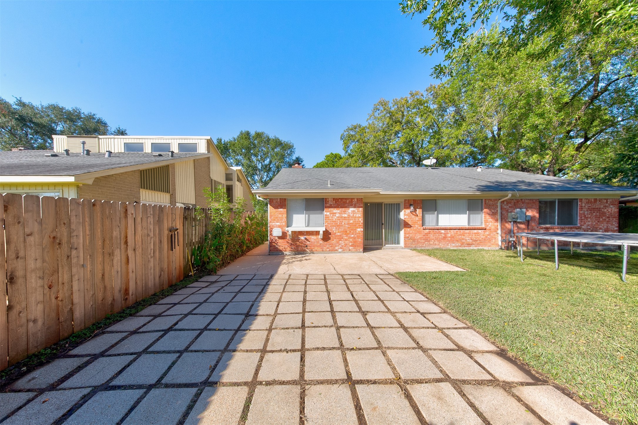 15802 Mill Point Drive Houston, TX 77059 - Photo 23 of 23 a front view of a house with a yard