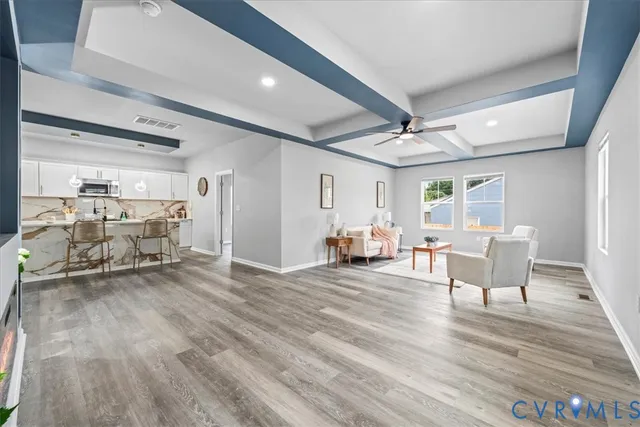 a view of a livingroom with furniture and a table