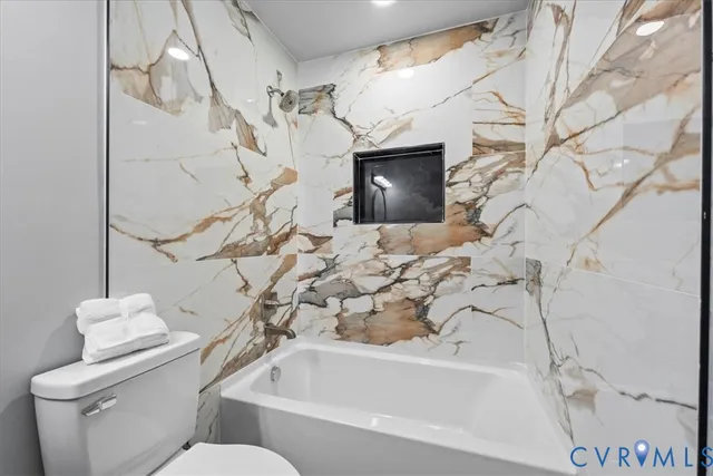 a view of a balcony with wooden floor