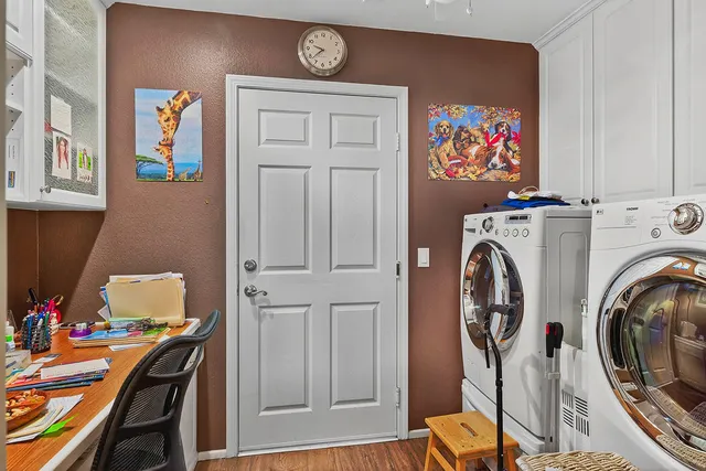 a view of an chairs and table in the patio