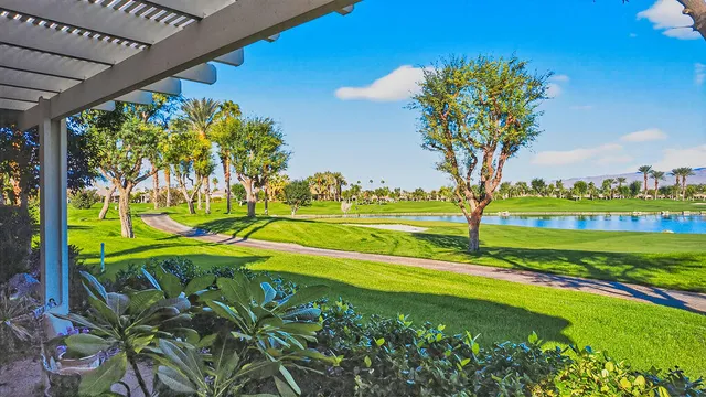 a view of a playground with a big yard