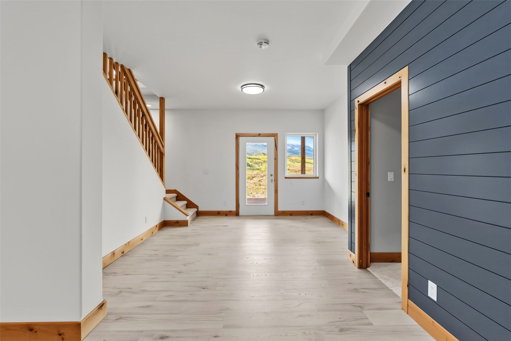 845 Elk Run Road Silverthorne, CO 80498 - Photo 36 of 50 a view of an entryway with wooden floor