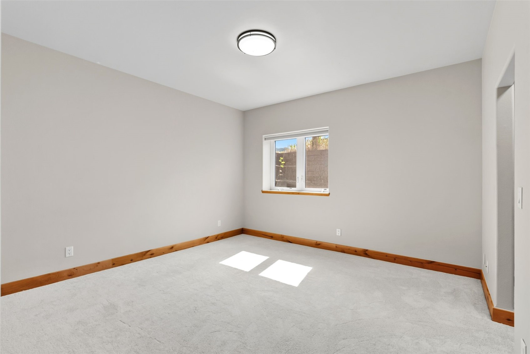 845 Elk Run Road Silverthorne, CO 80498 - Photo 41 of 50 an empty room with a window